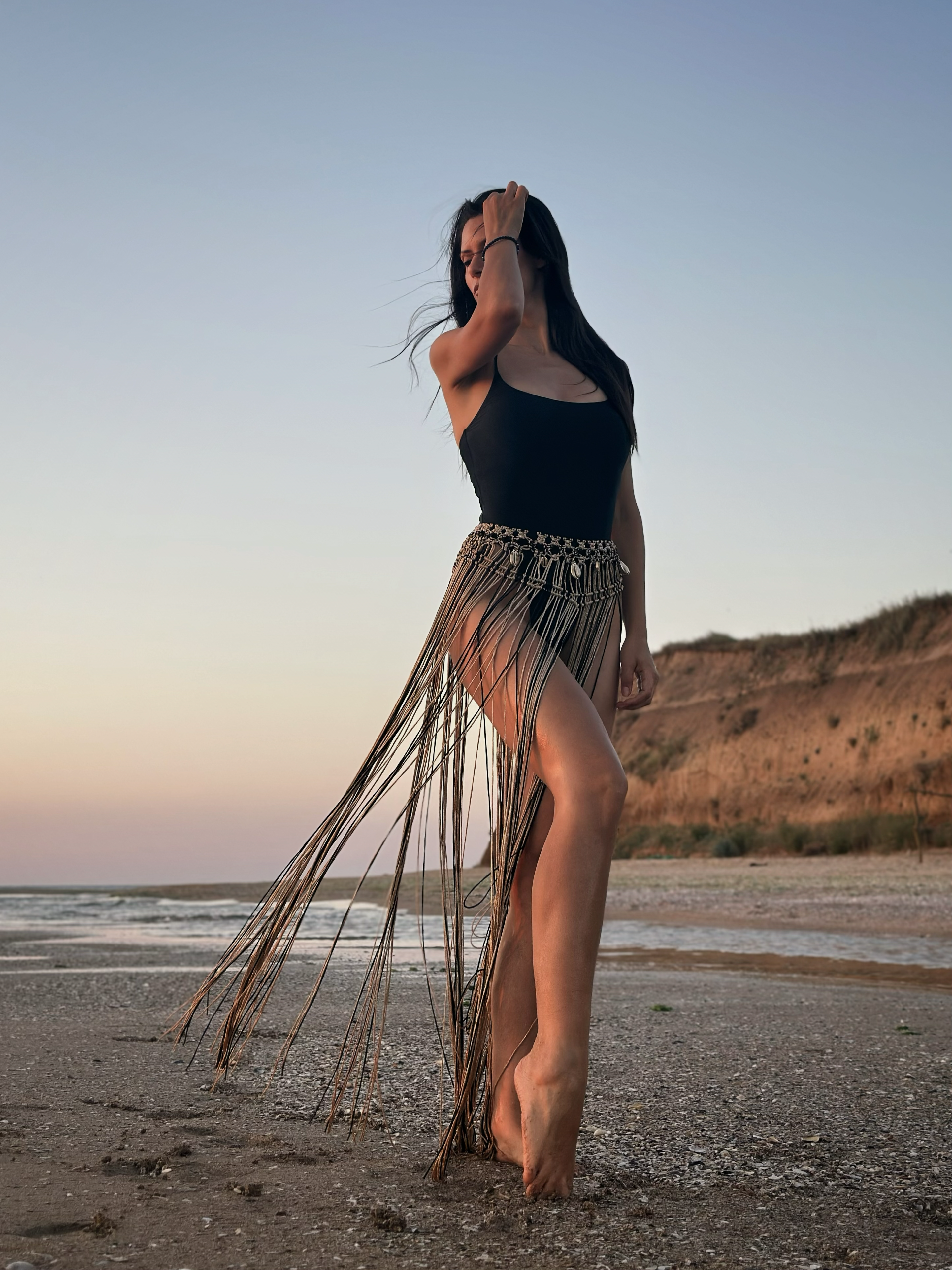 Gold metallic wrap skirt with seashell accents & fringe | Luxury artisan resort wear for beach & glam clubs